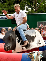 Sam Champion rides a mechanical bull 7.13.12